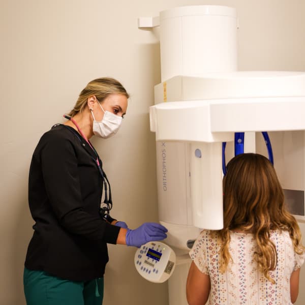 A young person preparing to receive treatment